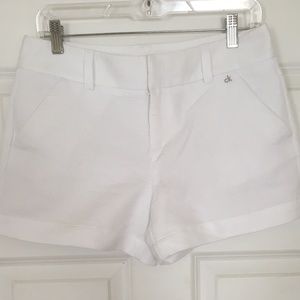 (NEVER WORN)CALVIN KLEIN WHITE SHORTS - SIZE 4